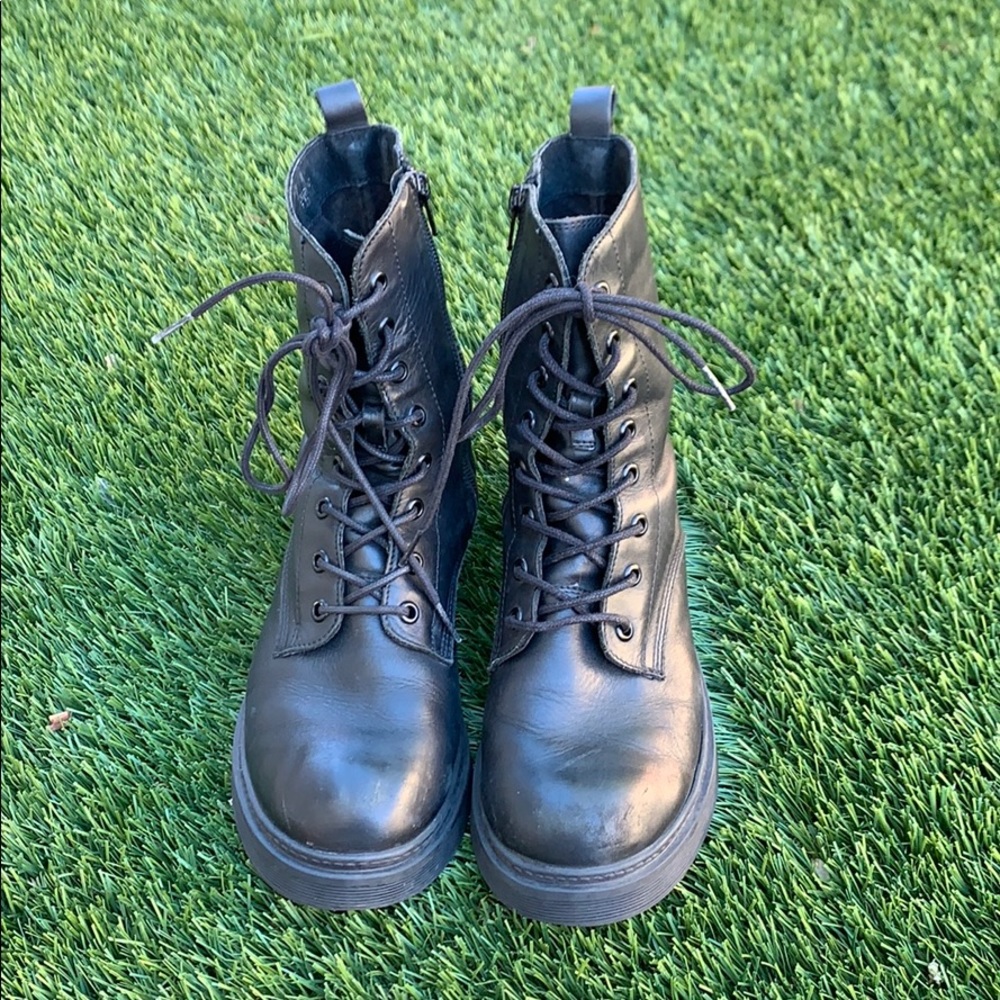Black leather combat boots